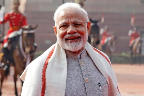 India's Prime Minister Narendra Modi poses after the ceremonial reception for South Africa's President Cyril Ramaphosa at the forecourt of India's Rashtrapati Bhavan Presidential Palace in New Delhi