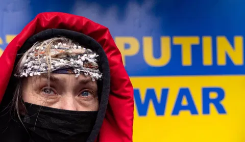 A protester attends a rally against Russia's military operation in Ukraine