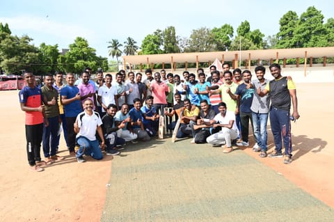 Participants of both teams pose for a picture