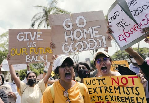 People shout slogans against Sri Lanka's President Gotabaya Rajapaksa and demand that Rajapaksa family politicians step down