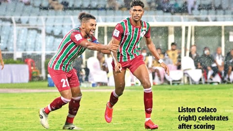 Liston Colaco (rights) after scoring