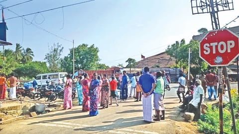 Relatives of the deceased girl staging a road blockade in Tiruchy on Monday