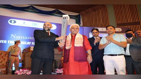Grandmaster Pravin Thipsay and J-K LG Manoj Sinha.