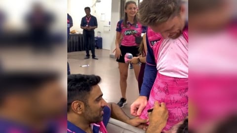 Jos Buttler with Ravichandran Ashwin