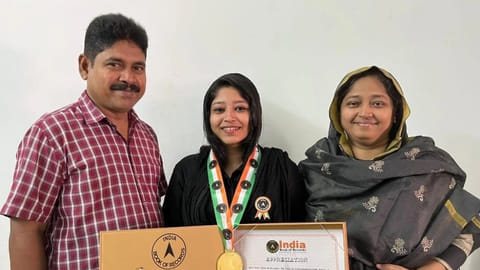 Najiya Navas with her parents