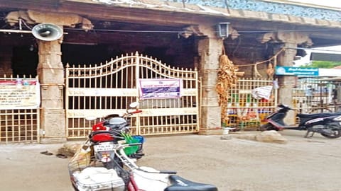 The closed Amma Mandapam ghat with warning banner in Tiruchy on Monday