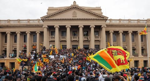 Demonstrators protest inside the Presidential Secretariat premises, after President Gotabaya Rajapaksa fled