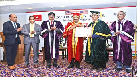 LUC president Prof Dr Amiya Bhaumik presents honorary doctorate to Pro Chancellor Dr Ravi Pachamoothoo