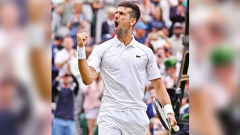 Novak Djokovic celebrates winning against Jannik Sinner