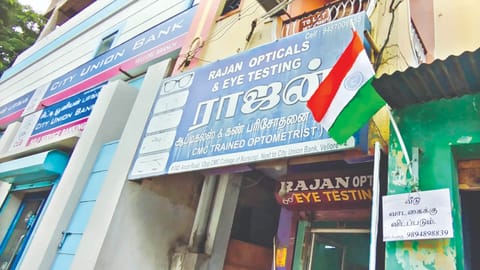 A flag hoisted atop a shop not lowered in Vellore till Friday.