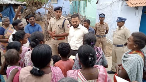 Tenkasi Collector P Akash along with SP R Krishnaraj and officials interact with people at Panchankulam village.