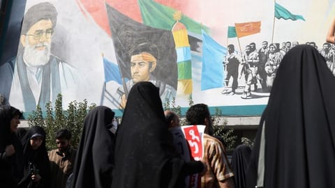Iran's Supreme Leader Ayatollah Ali Khamenei is seen on a building during a rally against the recent protest gatherings in Iran