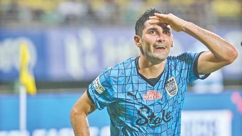 Jorge Pereyra Diaz reacts after scoring against his former club.
