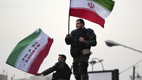 At World Cup, US soccer scrubs Islamic emblem from Iran flag