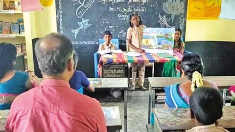 Mordana PU middle school teachers listening attentively to lessons being taken by students of Class 8 in the school near Gudiyattam on Thursday