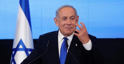 Likud party leader Benjamin Netanyahu addresses his supporters at his party headquarters during Israel's general election in Jerusalem