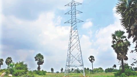 The power transmission tower on patta land at Brammapuram village in Katpadi taluk, Vellore