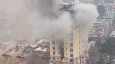 View of a hotel fire in Shahr-e-Naw neighborhood where gunfire was also heard in Kabul