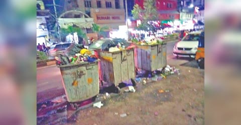 The three dustbins placed almost on the mid of the Gandhi Irwin Road near Egmore railway station