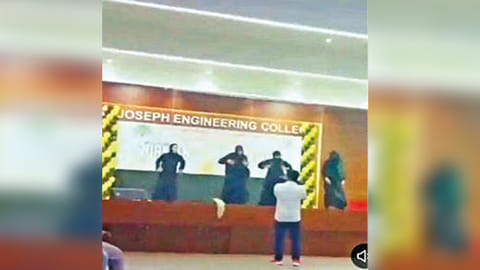 Students dancing in burqa