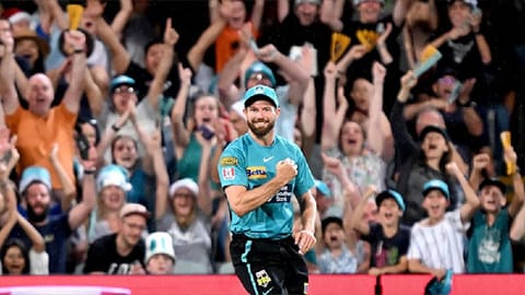 Michael Neser celebrates after taking catch