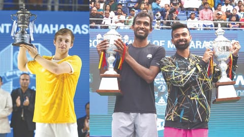 (L) Tallon Griekspoor holds the winner?s trophy
(R) India?s N Sriram Balaji and Jeevan Nedunchezhiyan
with the runners up trophy in doubles
