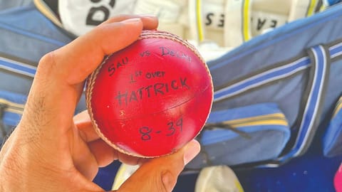 Jaydev Unadkat poses with the hat-trick ball