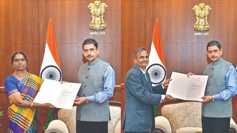 Dr K Kala and Dr S Arumugam receiving certificates of
appointment from Governor RN Ravi on Friday