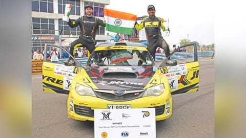 Gaurav Gill (left) and co-driver Aniruddha Rangnekar celebrate their victory in the second round.