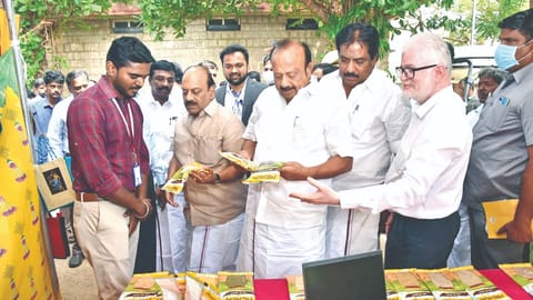 MRK Panneerselvam takes a look at a millet product in the exhibition at Madurai on Tuesday