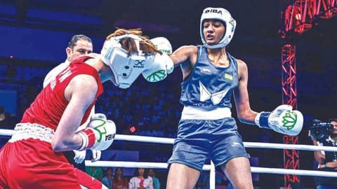 Nitu in action against Madoka Wada of Japan.