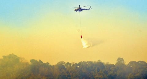IAF chopper deployed in firefighting operations in Madukkarai range on April 16