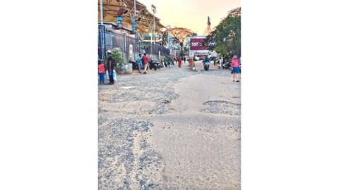 Pothole-filled road in Chromepet