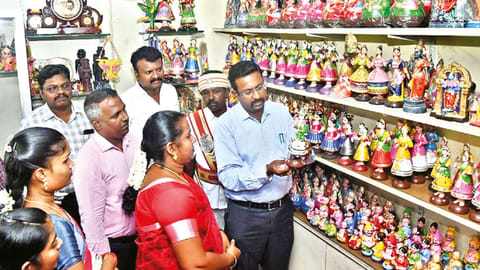 Collector Dinesh Ponraj Oliver visiting one of the stalls run by women SHGs on Wednesday