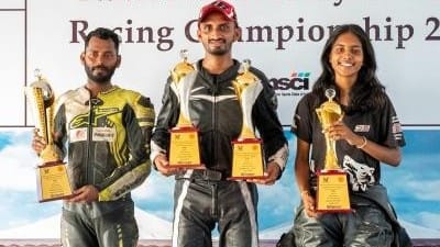 Abdul Shaikh (c) in drag racing championship