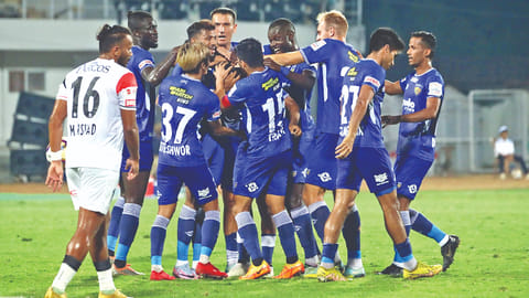 Chennaiyin FC players celebrate scoring a goal against NorthEast United