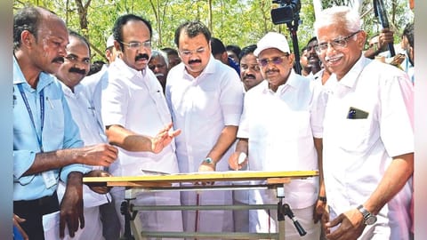 Minister Thangam Thennarasu consulting officials after inaugurating excavations
at Porpanaikottai in Pudukkottai on Saturday.