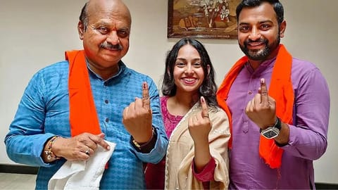 Basavaraj Bommai with his family after casting vote for Karnataka Assembly elections, in Shiggaon.