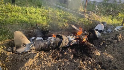 Fragments of a Russian rocket which was shot down by Ukraine's air defence system are seen after the night rocket attack in the Kyiv region, Ukraine