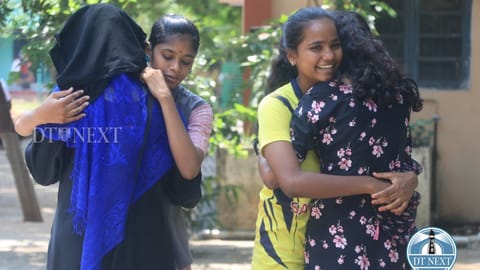 Students greeting each other