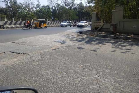 The uneven patch on the road