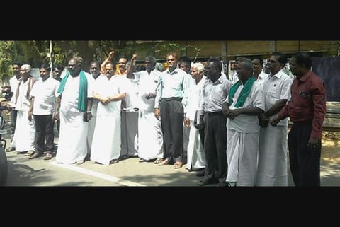Farmers stage a protest in Tiruchy on Monday