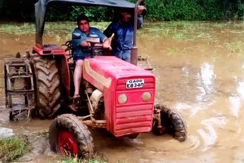 Screen grab of Congress MLA Aleixo Reginaldo Lourenco ploughing the fields