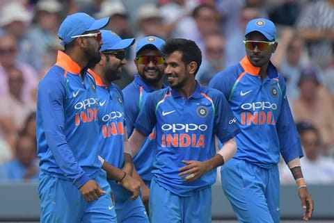 Indian team celebrates the wicket of England's Moeen Ali during the 2nd ODI match