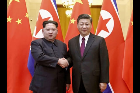 Xi Jinping and Kim Jong-un