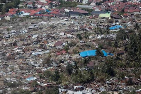 An aerial view of earthquake damage to an area in Palu, Central Sulawesi, Indonesia