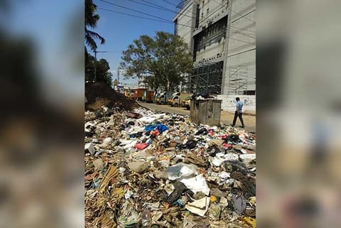 Garbage fills the road leading to Poomagal Street from Dhanakoti Raja Street in Ekkaduthangal