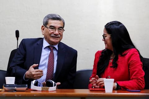 Former military intelligence chief Jose Mauricio Rodriguez attends his trial on genocide and crimes