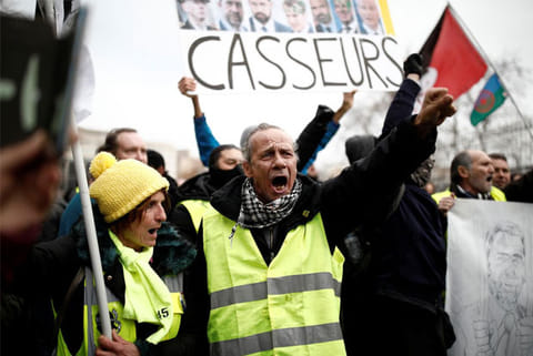 More French protests see roads blocked, trains disrupted and scuffles in Paris