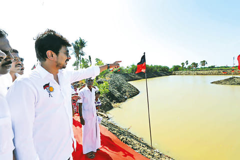 DMK youth wing secretary Udhayanidhi Stalin inspecting the desilted Vathamadayan pond near Tirukkuvalai